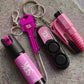 Pink self defense tool laid out. pepper spray, key knife, safety alarm, car escape tool